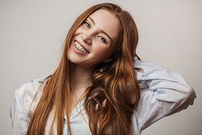 Redhead with Braces Smiling
